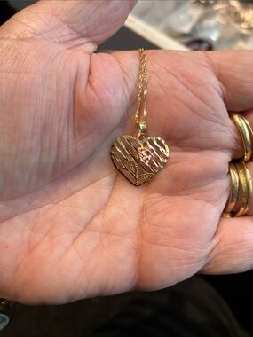 10 K Two Tone Heart on an 18” 10K Chain
1.35 Grams.  Lovely!
